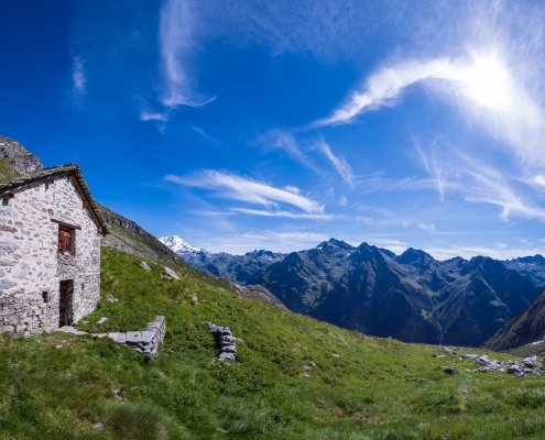 Overview at Alpe di Valfredda, in the background the valley of Valdobbiola