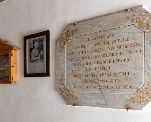 The plaque commemorating Nicolao Sottile, the founder of the hospice