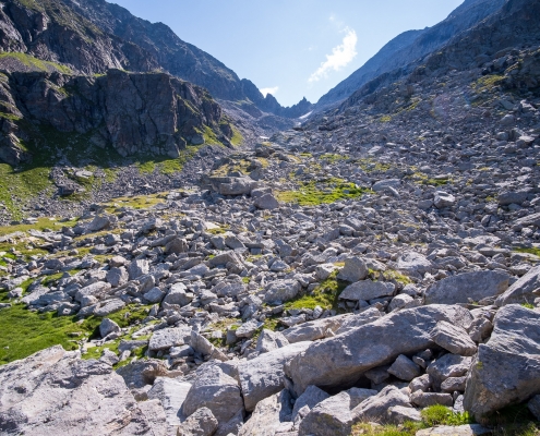 Ascend to the first snowfield by standing on the edge of the central ridge