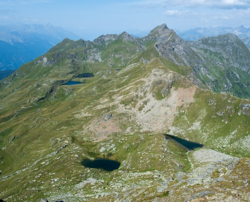 The lakes of Valfredda (foreground), Palasina (background) and nearby Corno Bussola