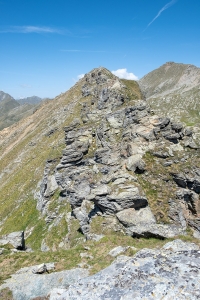 The ridge appears after the summit