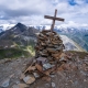 The little summit cairn of Corno Vitello, Testa Grigia in the background